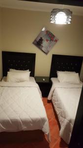 En eller flere senge i et værelse på Porto marina 3