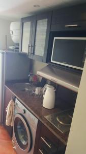 Køkken eller tekøkken på Porto marina 3