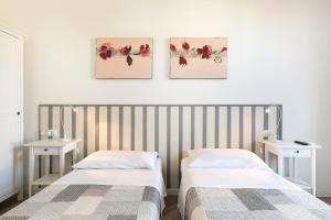 Postel nebo postele na pokoji v ubytování La Terrazza