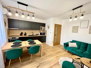 Kuchyň nebo kuchyňský kout v ubytování Apartmány ASYMETRIK s parkováním a možností snidaně