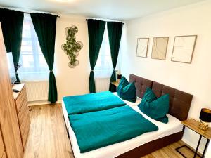 Postel nebo postele na pokoji v ubytování Apartmány ASYMETRIK s parkováním a možností snidaně