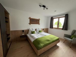 A bed or beds in a room at Studler-Eck