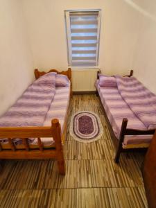 Postel nebo postele na pokoji v ubytování Konak Kod Gorana 3