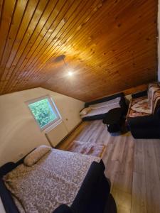 Postel nebo postele na pokoji v ubytování Konak Kod Gorana 3
