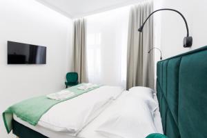 Postel nebo postele na pokoji v ubytování Apartment house in Vienna