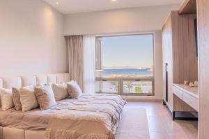 Ένα ή περισσότερα κρεβάτια σε δωμάτιο στο Extraordinary Beachfront Danzante Bay Loreto