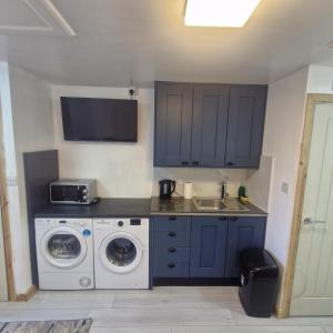 Η κουζίνα ή μικρή κουζίνα στο Guest house in Rochdale Manchester