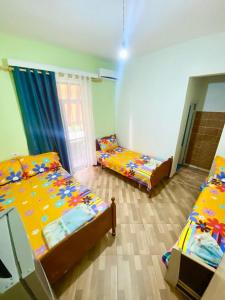 Letto o letti in una camera di Guest House 1