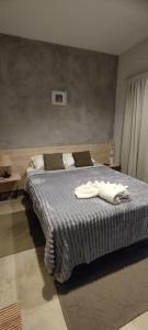 Una cama o camas en una habitación de Taguato