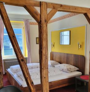 Ένα ή περισσότερα κρεβάτια σε δωμάτιο στο Mosel-Landhaus B&B