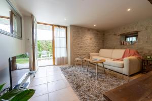 Χώρος καθιστικού στο Le Domaine Sainte Raffine, piscine, charme et insolite