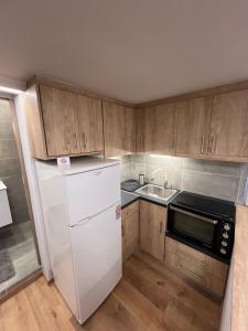 Kuchyň nebo kuchyňský kout v ubytování Imangination Home