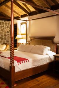 Postel nebo postele na pokoji v ubytování The Lodge & Spa at Pico Bonito