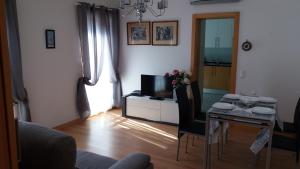 Χώρος καθιστικού στο Apartamento Novo com Piscina Olhão