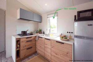 Afbeelding uit fotogalerij van Camping 3 étoiles - Piscine - ccbaddh in Louvie Juzon