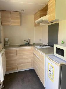 Eldhús eða eldhúskrókur á Camping 2 étoiles - ccbabhg