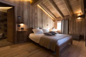 Voodi või voodid majutusasutuse Lavarets Chambres d’Hôtes toas