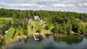 an island in the middle of a body of water at Zanurzeni w Ciszy in Nowe Motule