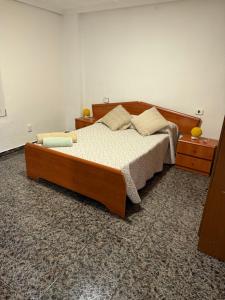 Ένα ή περισσότερα κρεβάτια σε δωμάτιο στο Apartamento puerto