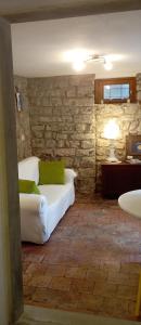 A bed or beds in a room at Casa Caterina - Riva di Solto - Iseo Lake