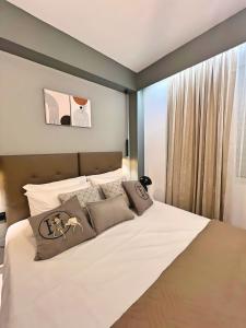 Ένα ή περισσότερα κρεβάτια σε δωμάτιο στο Sea Side Apartment Rhodes City Center