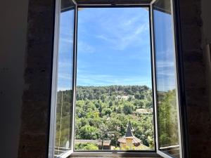 a window with a view of a town at Horizon village des Pennes Mirabeau in Les-Pennes-Mirabeau