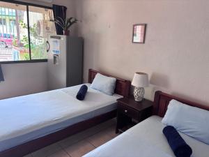 Postel nebo postele na pokoji v ubytování Casitas de la Paz