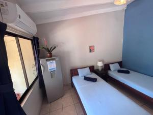 Postel nebo postele na pokoji v ubytování Casitas de la Paz
