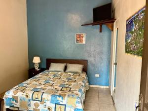 Postel nebo postele na pokoji v ubytování Casitas de la Paz