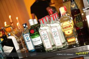 a group of bottles of alcohol on a table at AL Montenegro in Paredes de Coura