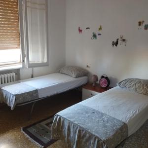 A bed or beds in a room at Relax al mare