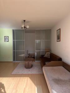 Katil atau katil-katil dalam bilik di Cozy Maumedziu apartment