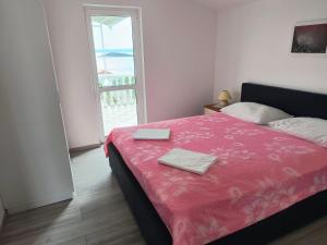 Ένα ή περισσότερα κρεβάτια σε δωμάτιο στο Apartment Glory