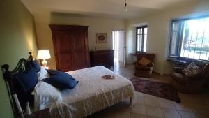 A bed or beds in a room at Cascina Sant'Eufemia