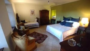 A bed or beds in a room at Cascina Sant'Eufemia