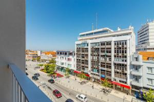 arial view of a city with cars on a street at Timeless Studio - Avenida in Aveiro