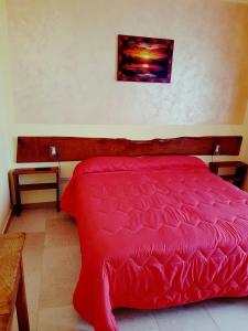 Postel nebo postele na pokoji v ubytování B&B Antica Trattoria