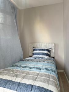 Katil atau katil-katil dalam bilik di Modern Apartment 3BR 1BD West New York 15 minutes to NYC +17 gambar