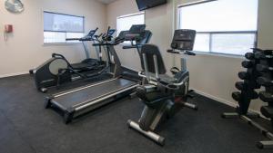 a gym with two treadmills and cardio machines at Holiday Inn & Suites Chihuahua Expo by IHG in Chihuahua