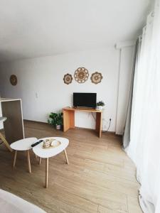 A television and/or entertainment centre at Mar y Sol