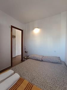 A bed or beds in a room at Mar y Sol