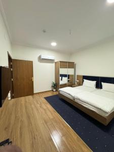 Postel nebo postele na pokoji v ubytování As Salam Apartment