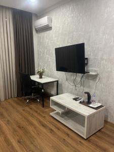 TV a/nebo společenská místnost v ubytování Apart Hotel Four Rooms