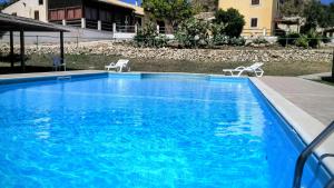 Piscina en o cerca de Agriturismo Timpa del Sole