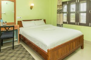 Postel nebo postele na pokoji v ubytování Gairibari Resort