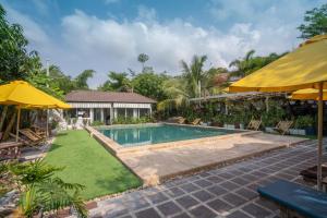 an image of a swimming pool in a villa at Sanssouci Kep in Kep