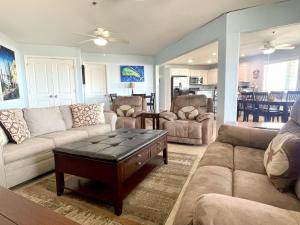 a living room with a couch and a table at Beachgate Condo Suites and Hotel 531 condo in Port Aransas