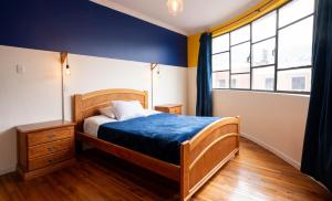 Voodi või voodid majutusasutuse Community Hostel Quito toas