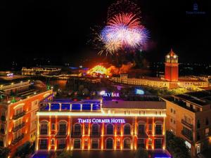 a view of a fire station with fireworks at night at Times Corner Amalfi Hotel in Phú Quốc