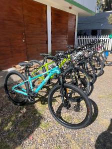 a row of bikes parked next to a building at RESORT ALAPA in Huancayo